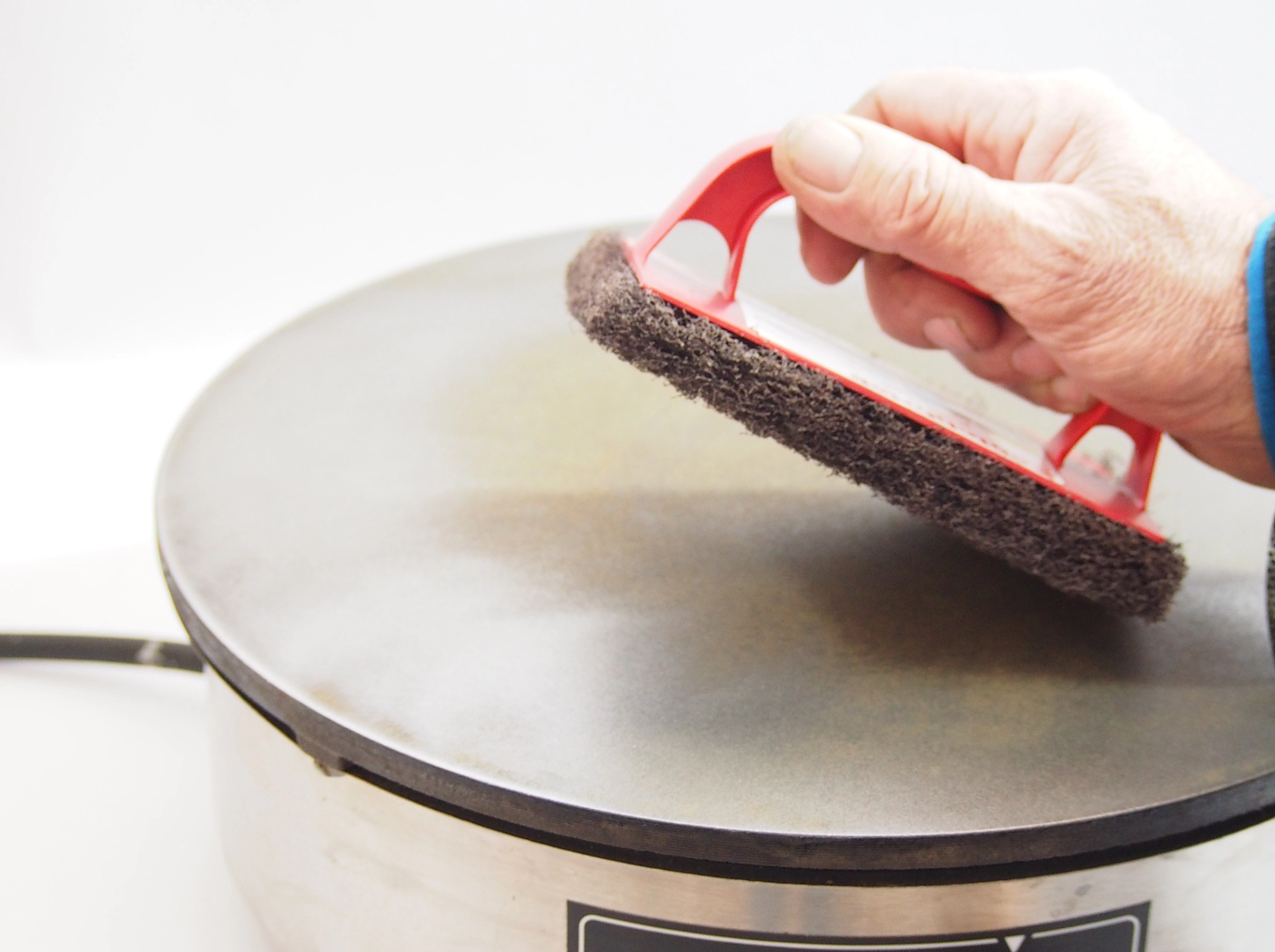 Poign&eacute;e de nettoyage pour cr&ecirc;pi&egrave;re